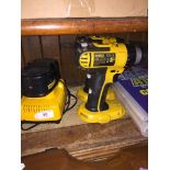 Two cordless Dewalt drills with 1 battery and a battery charger