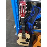 A childs Burswood acoustic guitar