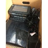 A box with Xbox 360 console and some accessories together 3 x iKarPC-W08A sat navs.