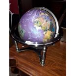 A hard stone globe.