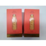 Two 7,5ml bottles of Yves Saint Laurent Nuevo perfume, one sealed, one has been opened.