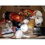 A mixed box including pottery, paperweights, and two Russian dolls