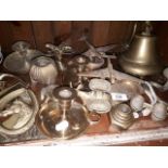 A collection of brassware