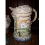 A Clarice Cliff flamingo jug (damaged).