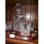 Sterling crystal decanter set on tray