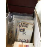 A box of stamps, first day covers, etc.
