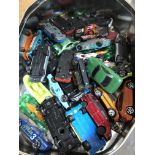 A tin of toy cars