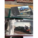 Two albums containing 80 steam engines postcards