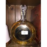 A 0.5L 2008 Liquid Gold brandy with 22 karat gold flakes, sealed and full.