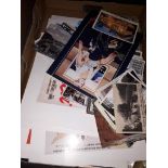 A box of ephemera including postcards
