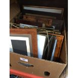 A box of photo frames, etc.