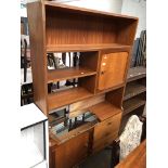 A Stonehill teak room divider cabinet