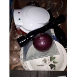 A box including a cake pop maker, kitchen ware etc.