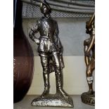 A plaster figure of a knight.