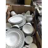 A box of Johnson Brothers Ironstone dinner ware