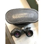A cased set of Russian binoculars