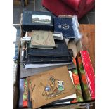 Box of mainly early 20th century photo albums and postcards