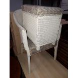 White woven chair and linen box