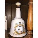 A Bells Queen Elizabeth whisky decanter - full and sealed.