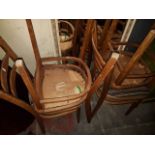 A set of 4 light wood chairs