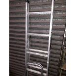 A small aluminium stepladders and a 3 way adjustable ladders.