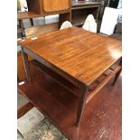 A teak square 2 tier coffee table