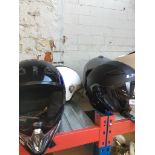 Four motorcycle crash helmets
