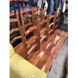 A set of 8 hardwood rustic style dining chairs