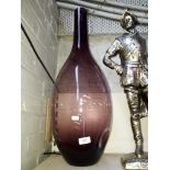 A large purple glass vase.