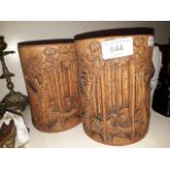 A pair of carved bamboo brush pots