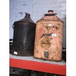 An Aladin paraffin can and a railway oil can.