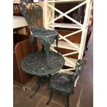 A painted galvanised metal patio table and 2 chairs set
