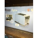 A boxed Swan 2 slice toaster, unused.