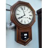 A drop dial wall clock circa 1900 the dial signed 'Smiths London'.