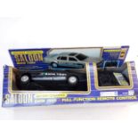 A boxed battery operated Saloon BMW 750i toy car