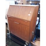 A 1960s teak S Form bureau by Sutcliffe of Todmorden - with key