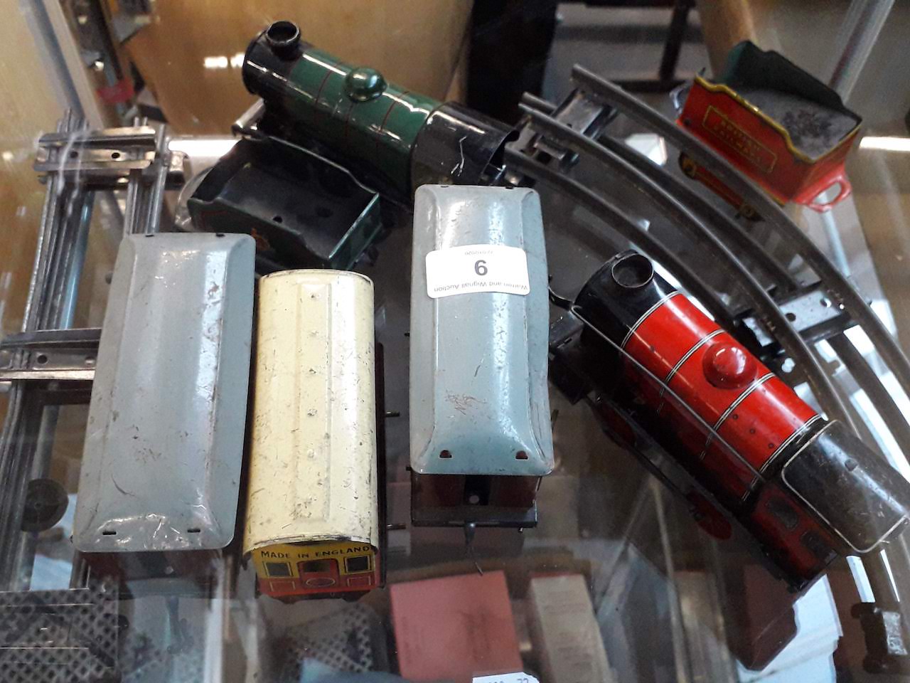 Collection of tin plate model railway toys and some tin track