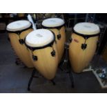 Two sets of Stagg conga drums on stands.