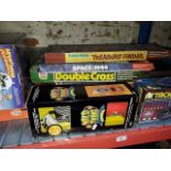 A quantity of boxed vintage board games and arcade games etc including Bandai, Ideal, etc