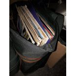 A bag of vinyl LPs