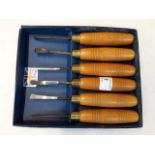 A set of 6 woodcarving chisels.