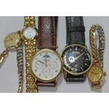A group of five wristwatches including a ladies Omega Geneve, a vintage 1960s gents Roamer, Accurist