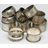 A group of 10 hallmarked silver serviette rings, various dates and makers, wt. 7oz.