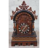 A late 19th century black forest cuckoo clock, the brass twi spring driven movement striking on