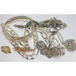 A small quantity of gold and silver including a 14K watch, a 9ct gold brooch, a silver bangle, a