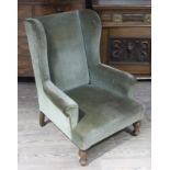 A 19th century wingback armchair, width