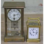 A French late 19th century four glass mantel clock height 21cm and a gilt brass carriage clock.