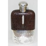 A silver plated and leather bound hip flask by Walker & Hall, length 18cm. Condition - good, glass