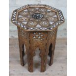 A moorish inlaid occasional table, height 52cm.
