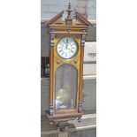 A late 19th century walnut Vienna wall clock.
